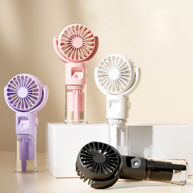 🌀 50% RABATT! 💧 Tragbarer wiederaufladbarer Handventilator mit Nebelfunktion – Kühlender Sprühnebel & 3 Geschwindigkeiten – Perfekt für heiße Tage, Reisen oder Outdoor-Aktivitäten 🌬️✨