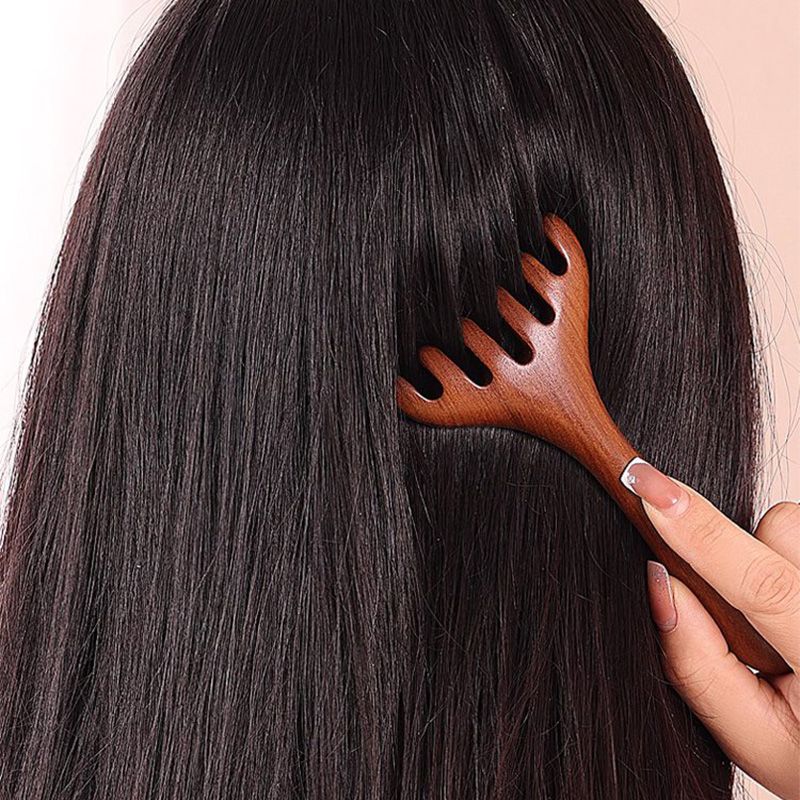 Massagekamm mit sechs Zinken für die Meridiane