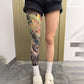 Dehnbarer Beinärmel mit Tattoo-Print