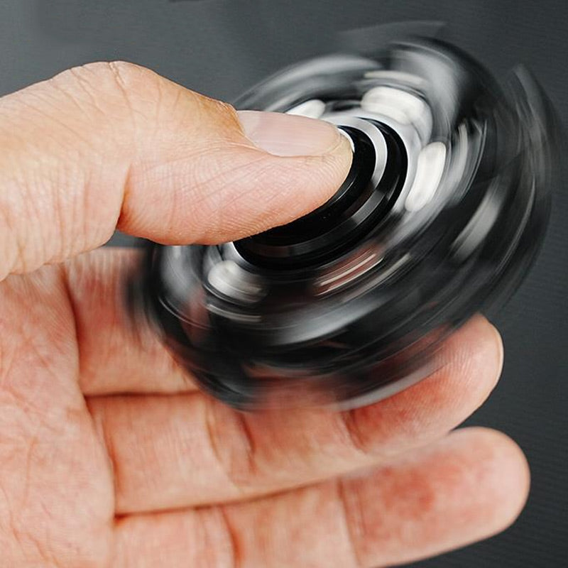 Kreativer Fidget-Slider mit offener Panzerung und Kreisel