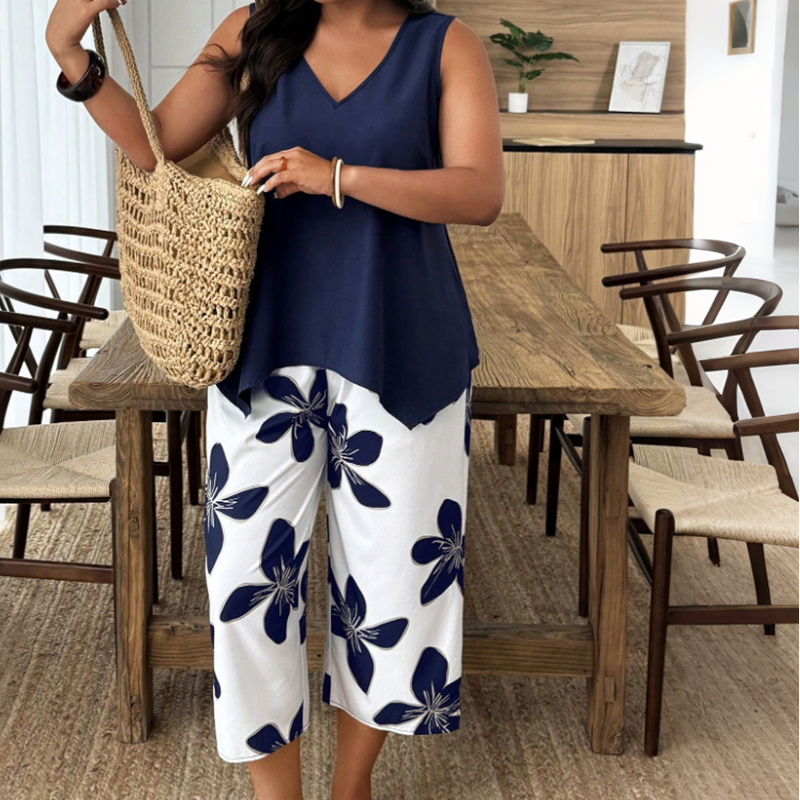 🌸✨ Set aus asymmetrischem Damenoberteil und Caprihose mit Blumenmuster – vielseitig, farbenfroh, bequem 🌺
