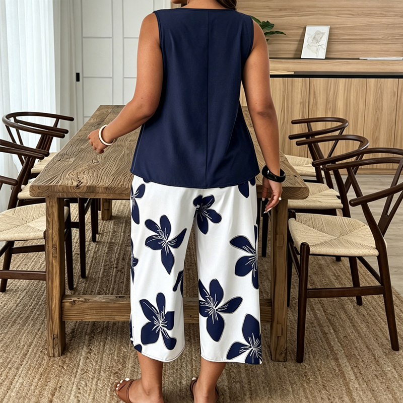 🌸✨ Set aus asymmetrischem Damenoberteil und Caprihose mit Blumenmuster – vielseitig, farbenfroh, bequem 🌺