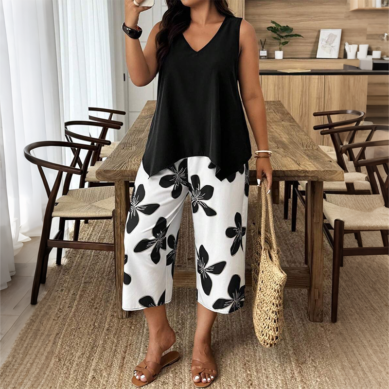 🌸✨ Set aus asymmetrischem Damenoberteil und Caprihose mit Blumenmuster – vielseitig, farbenfroh, bequem 🌺